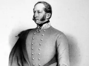 Generál jízdy Joseph Franz Lobkowitz vévoda v Roudnici (1803–1875), dekorovaný hvězdou Řádu železné koruny a hvězdou velkokříže Vojenského řádu Marie Terezie. Litografie Augusta Prinzhofera (1817–1875) z roku 1847.